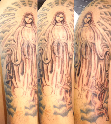 無原罪の聖母マリアと天使のタトゥー